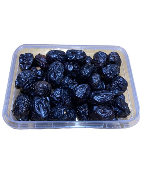 Datte Ajwa de Médine 450g en Arabie Saoudite elles sont facilement reconnaissables par leur forme arrondie et leur couleur presque noire